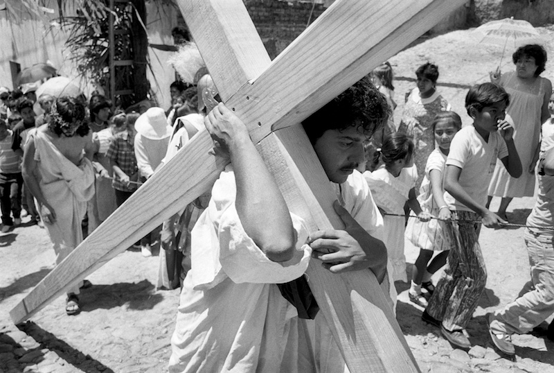 Christ carries the cross during Via Cruces