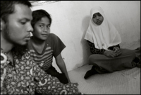A girl is still in grieve a year after the Tsunami, and a teacher tries to talk with her