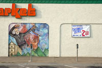 A mural of Father Hidalgo on Jerry's Market, painted by "Ceibas"